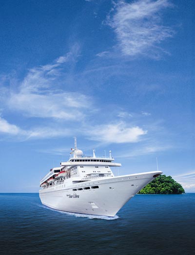 Prow-view of Star Cruise Liner Cutting Through Sea, Green Island in Background